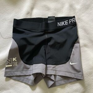 small but can fit xs nike pros gray and black worn 3-4 times great condition
